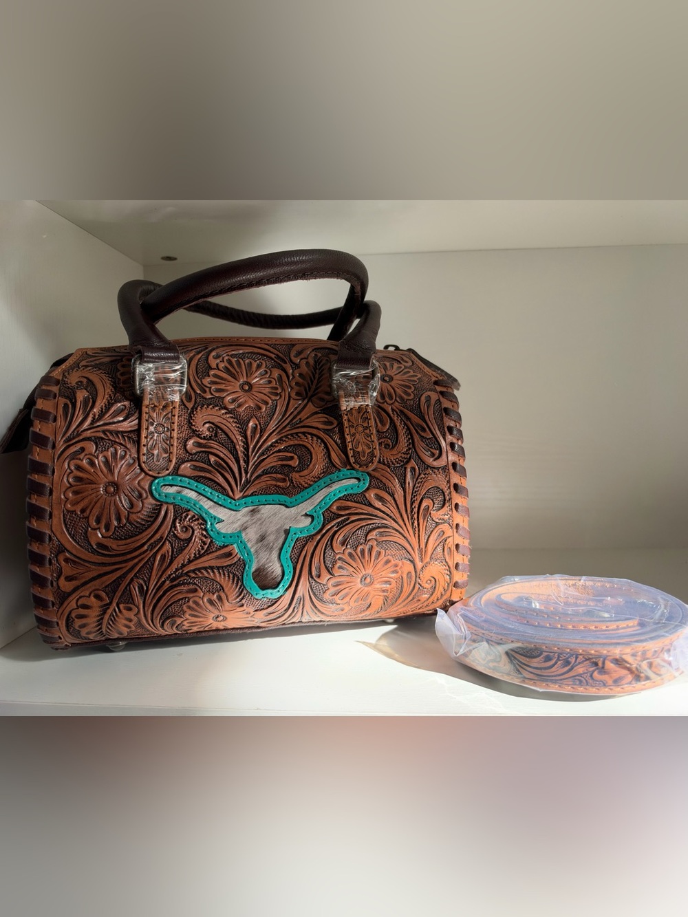 tooled leather satchel with turquoise longhorn accent